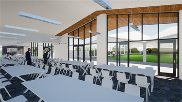 White tables and chairs in meeting room