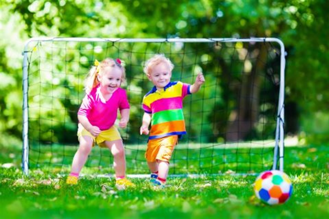 two_toddlers_playing_soccer