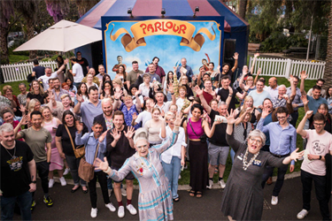 A large group of people posing for a photo